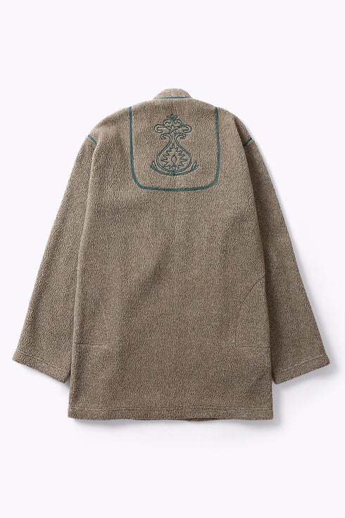 Jacket in faux fur with embroidery on the back
